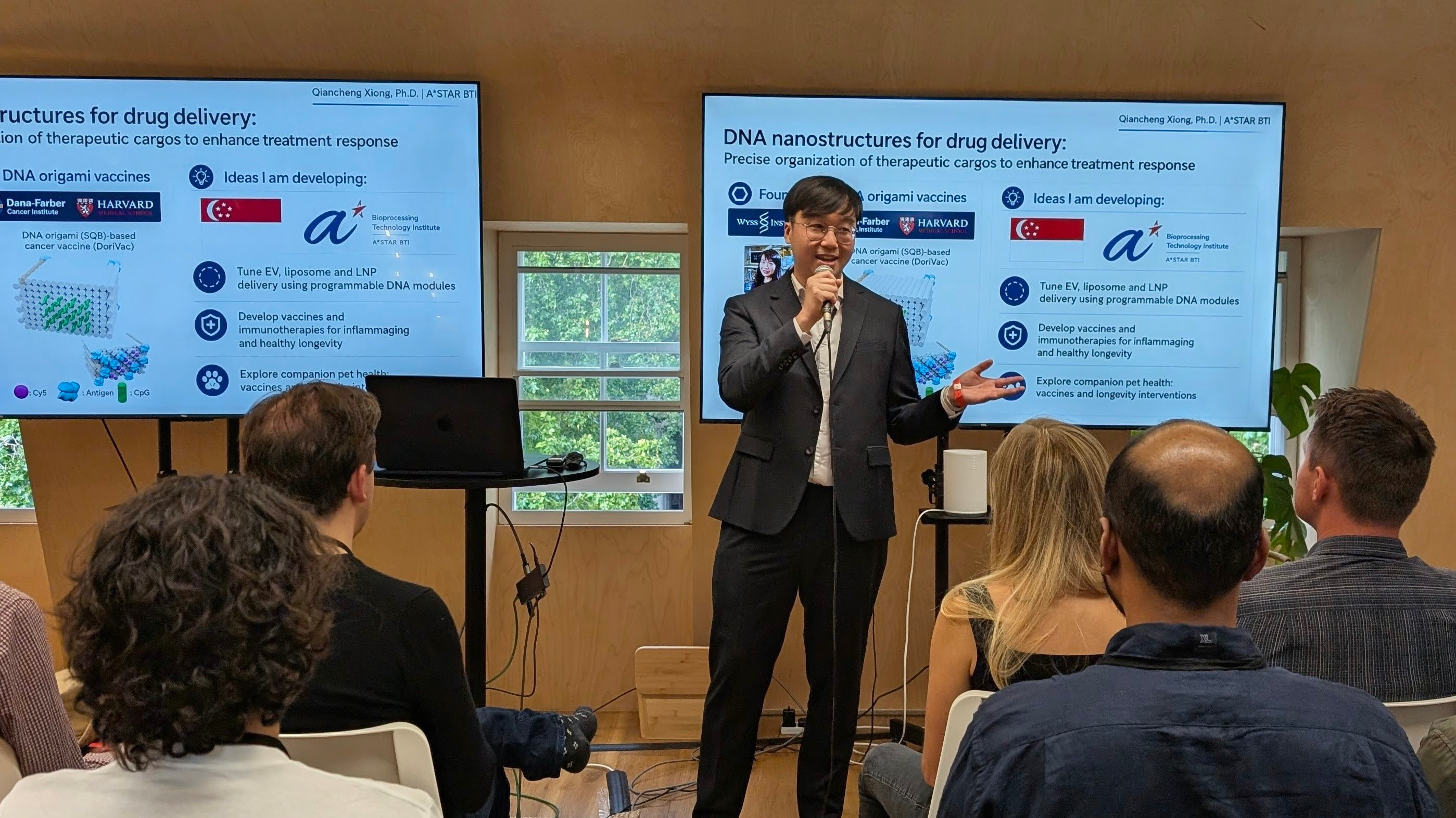 Qiancheng giving a talk at Foresight Vision Weekend UK in London